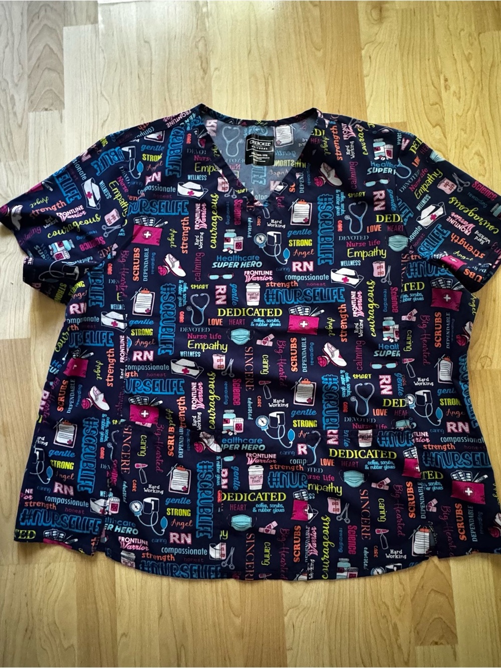 Nurse-Themed Multicolor V-Neck Scrub Top - RN Graphic Print